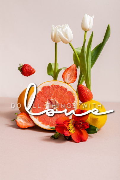 floral and fruit composition with tulips, red Alstroemeria, summer fruits near do all things with love lettering on beige - Foto, afbeelding
