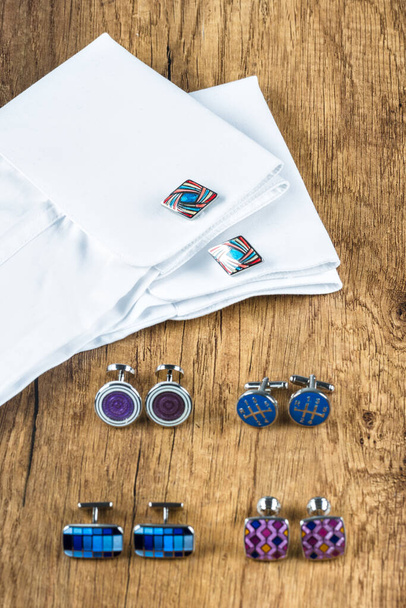 Luxury men's cufflinks. Sleeve white man's shirt and  cufflinks. - Photo, Image