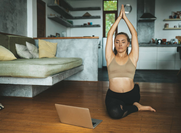Woman practicing home yoga. Meditation. lifestyle concept - Fotoğraf, Görsel