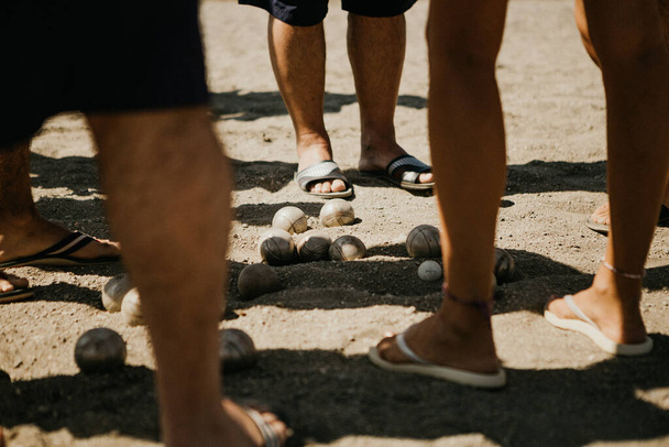 Leisure for vacationers on the beach retirees - a game of petanque - Photo, image