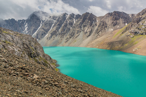 Ala-Kul lake in the Terskey Alatau mountain range in Kyrgyzstan - Foto, Imagen