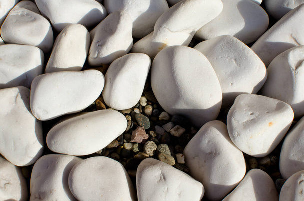 grupo de pedras brancas cinza na luz do sol, close up fundo, textura
 - Foto, Imagem