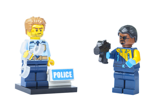 Racism and violence by the police against blacks, Lego police minifigures, attacking an African American with a gun, black life, anti-racism, stop killing blacks - Photo, Image