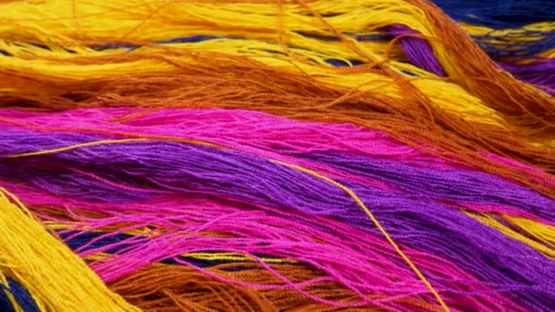 Pink, brown, yellow, purple thread as background - Footage, Video