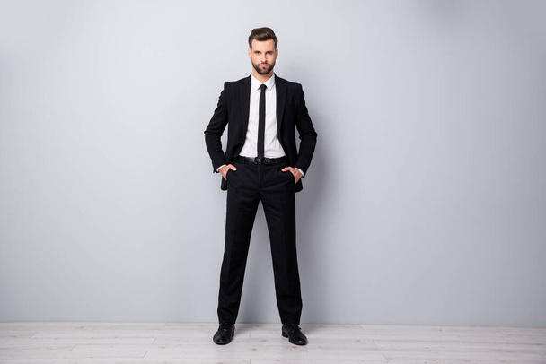 Full length photo of handsome business man real expert specialist put hands pockets wear good looking outfit isolated over grey color background - Foto, Bild