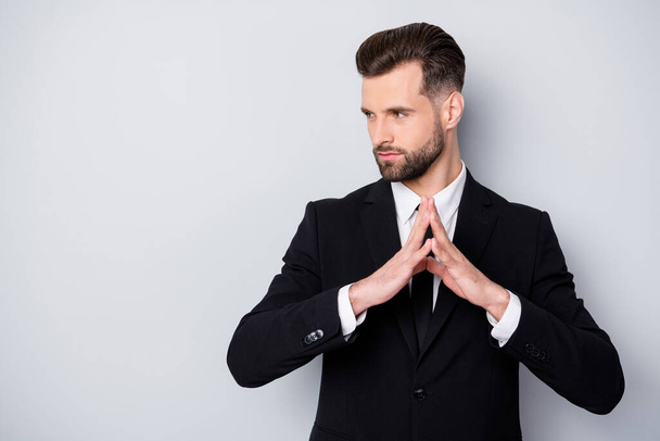 Profile side photo of serious pensive company owner man put hands together look copypsace think start-up problems contemplate decisions wear classy outfit isolated grey color background - Zdjęcie, obraz