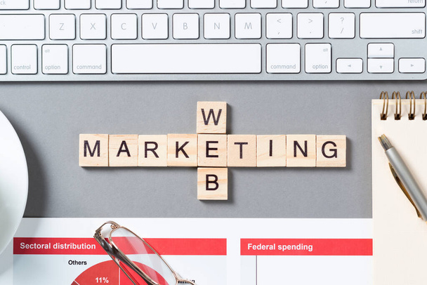 Web marketing concept with letters on cubes - Foto, Imagen