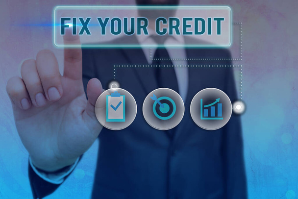 Escribir nota mostrando Fix Your Credit. Exhibición de fotos de negocios mejorar o aumentar su calificación o puntuación para obtener préstamo de dinero o hipoteca
. - Foto, imagen