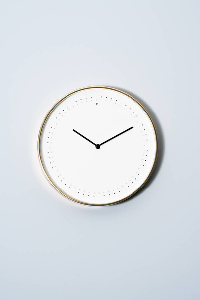 A wall clock on the wall. - Photo, Image
