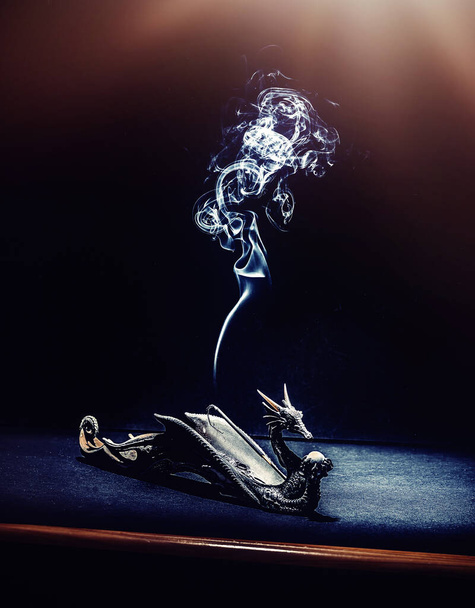 smoke incense stick, smoke on a black background. - Photo, Image