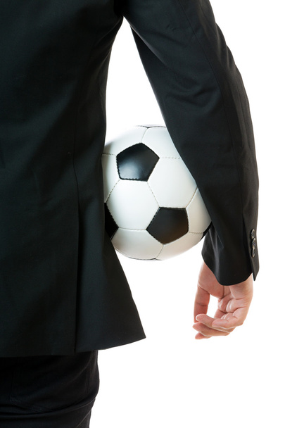 Businessman holding soccer ball - 写真・画像