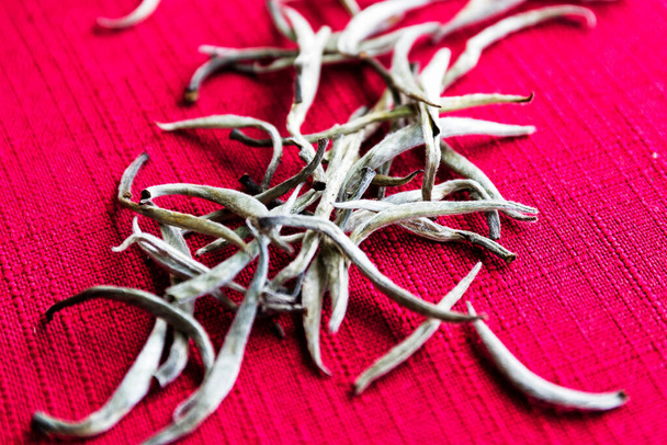 White tea on the red tablecloth - Photo, Image
