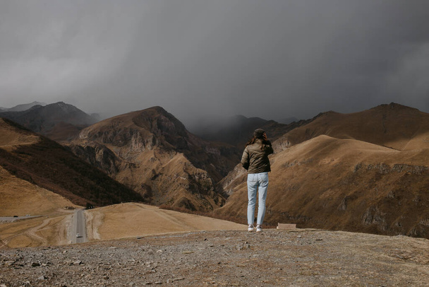 woman watching on Kazbegi mountains - Photo, Image