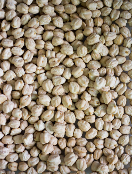 Plate of raw chickpeas filling the screen - Photo, Image
