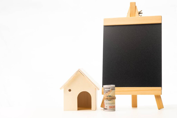 Miniature wooden house isolated against white background - Photo, Image