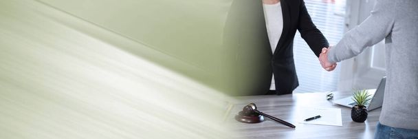 Handshake between female lawyer and male client after signing a contract; panoramic banner - Fotoğraf, Görsel