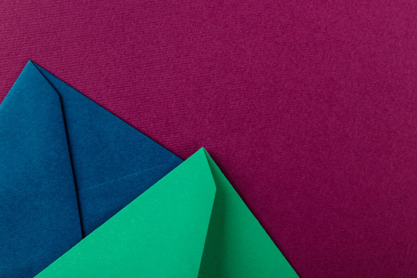 Colorful envelopes on a purple background. Mail envelopes on the table. - Valokuva, kuva