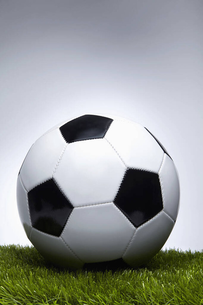 Voetbal op lichte achtergrond  - Foto, afbeelding