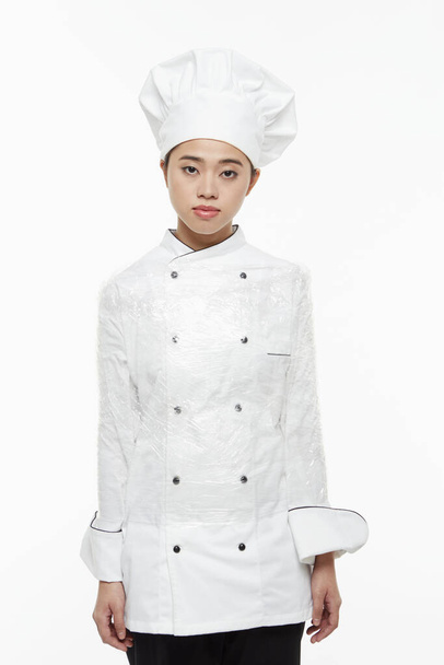 Female chef tied up with a cling wrap - Foto, afbeelding