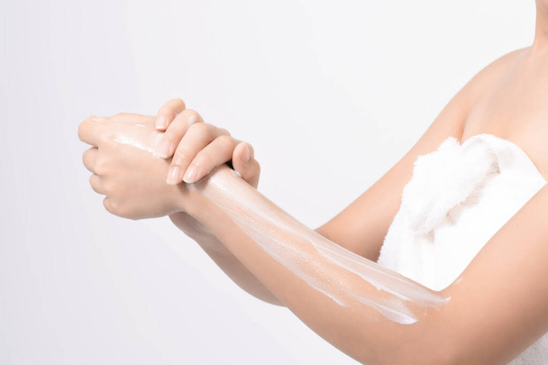 Women use body lotion on her arms. - Foto, Imagen