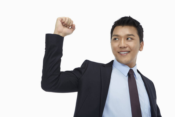 Businessman smiling and cheering - Photo, Image