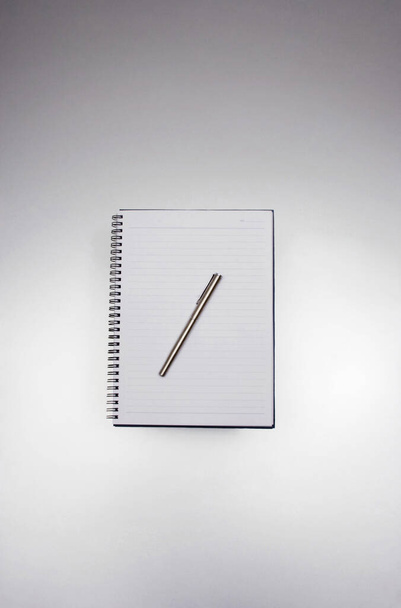 close up of Pen and notebook - Fotó, kép