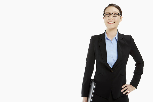Portrait of a businesswoman smiling - Foto, Bild