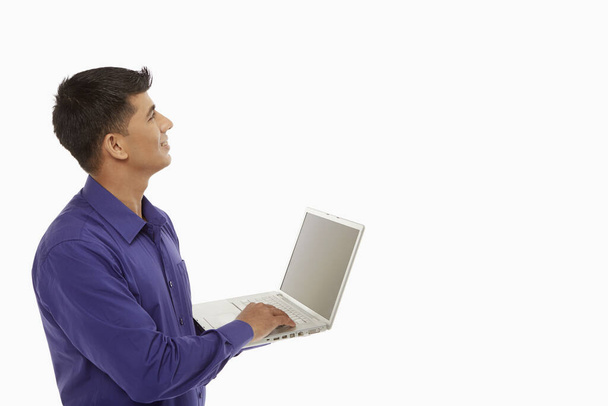 Businessman using a laptop - Φωτογραφία, εικόνα