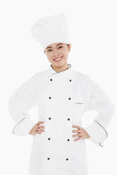 Portrait of a female chef smiling - Foto, Imagem