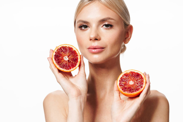 Image of beautiful young shirtless woman posing with red orange isolated over white background - Fotografie, Obrázek