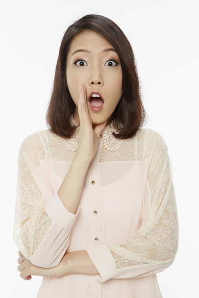 Woman with a shocked facial expression - Foto, Imagem