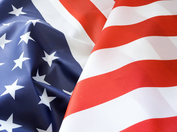 Nahaufnahme, der schöne Stoff der amerikanischen Flagge Hintergrund.  - Foto, Bild