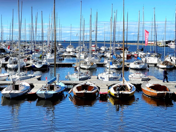 Tallinn ,Estonia, Baltic sea,yachting ,boats in harbor blue sky and sea on horizon - Photo, Image