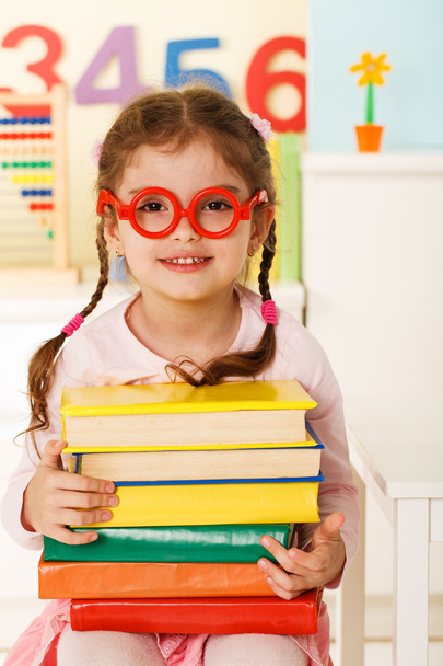 little genius with books - Photo, image