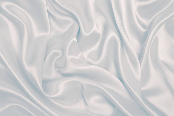 Smooth elegant grey silk or satin luxury cloth can use as wedding background. Luxurious background design   - Фото, зображення