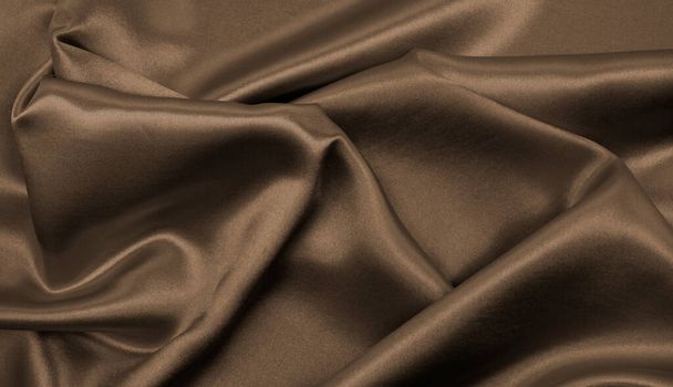 Smooth elegant brown silk or satin texture can use as abstract background. Luxurious background design wallpaper. In Sepia toned. Retro style - Photo, Image
