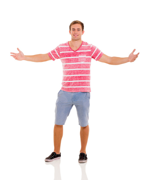 young man with arms open - Foto, Imagen