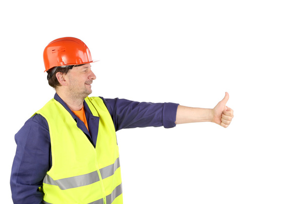 Worker in hard hat with hand up. - Photo, Image