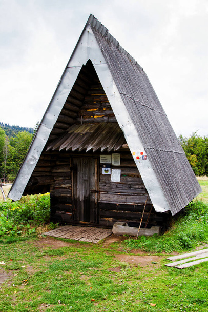 BESKIDY MOUNTAINS, POLAND - OCTOBER 10: Student shelter in Beskidy mountains, Poland on October 10, 2013. Shelters are used for primitive and short term accomodation. - Photo, Image