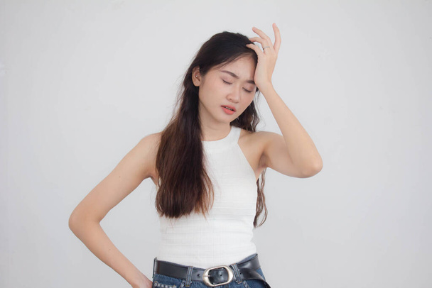 Portrait of thai china adult beautiful girl White shirt blue jeans Think - Fotó, kép