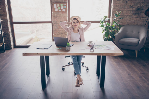 Portrait of her she nice attractive cheerful confident successful lady sitting in chair working remotely at modern industrial brick loft style interior workplace workstation open space indoors - 写真・画像