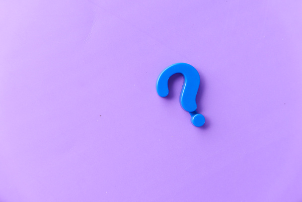 high angle view of question mark color background  - Photo, Image