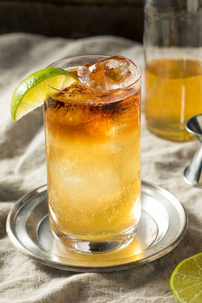 Boozy Rum Dark and Stormy Cocktail with LIme - Φωτογραφία, εικόνα
