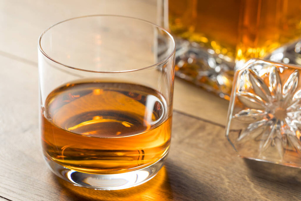Boozy Alcoholic Whiskey Neat in a Rocks Glass - Fotoğraf, Görsel