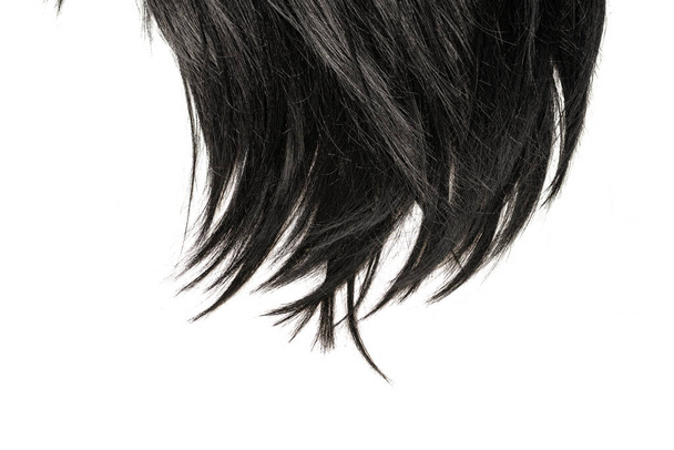 Schwarze Haarspitzen isoliert auf weißem Hintergrund.  - Foto, Bild