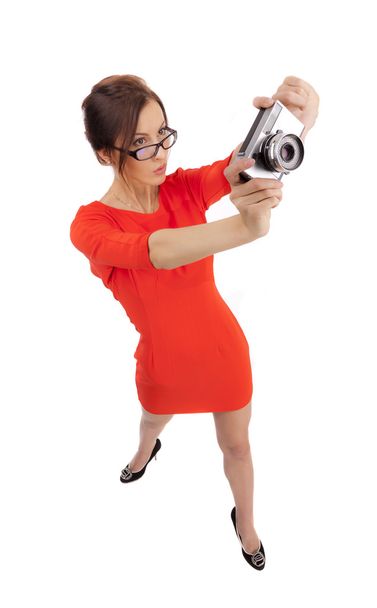 Girl in a red dress with shiny camera - Zdjęcie, obraz