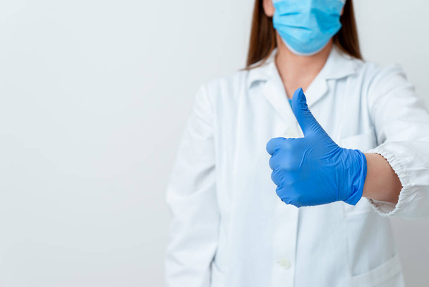 Person Wearing Medical Gown Gloves For Performing Laboratory Experiment. Holding Test Tube Of Blood For Health Condition Analysis - Foto, Imagem