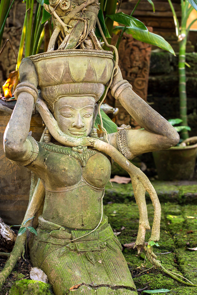 Ancient stone carved women statue - Foto, imagen