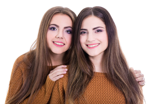 friendship concept - portrait of two girls isolated on white background - Foto, immagini