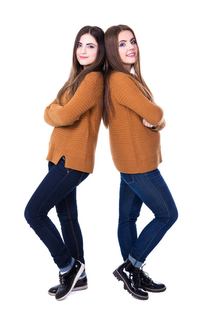 friendship concept - full length portrait of two girls isolated on white background - Photo, image